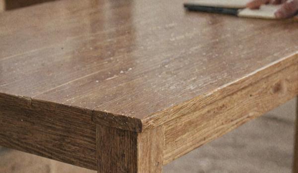Custom furniture finishing showing color matching and application techniques