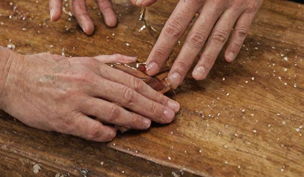 French polishing technique showing shellac application process